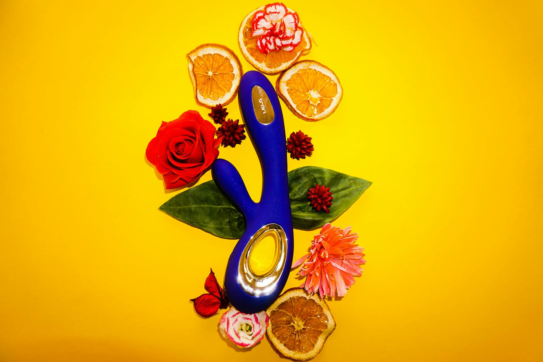 Bright yellow lemons on a warm background, evoking the look of a Lemon clitoral vibrator.